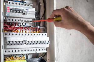 electrician fixing circuit board